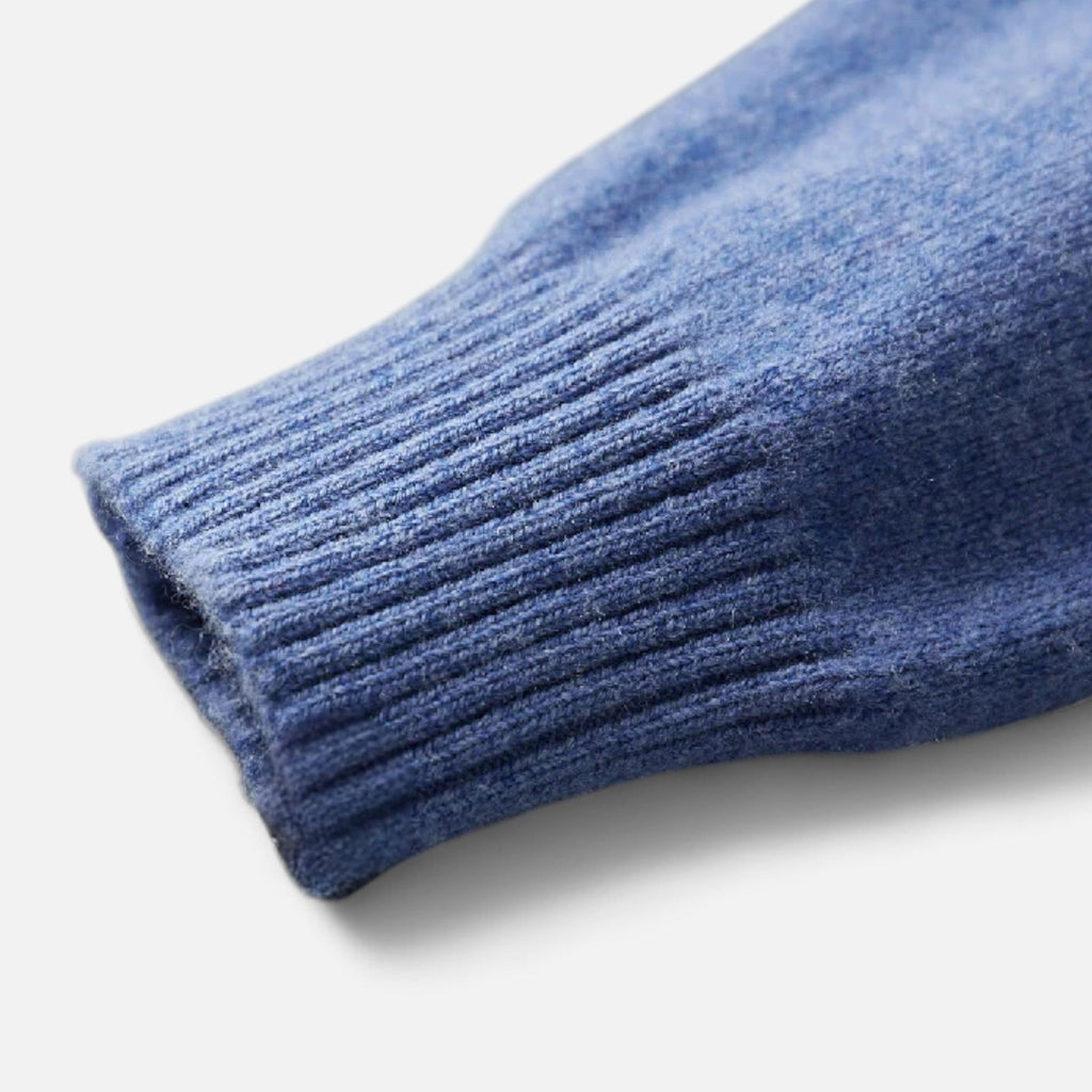 Pure wool roll-neck sweater worn