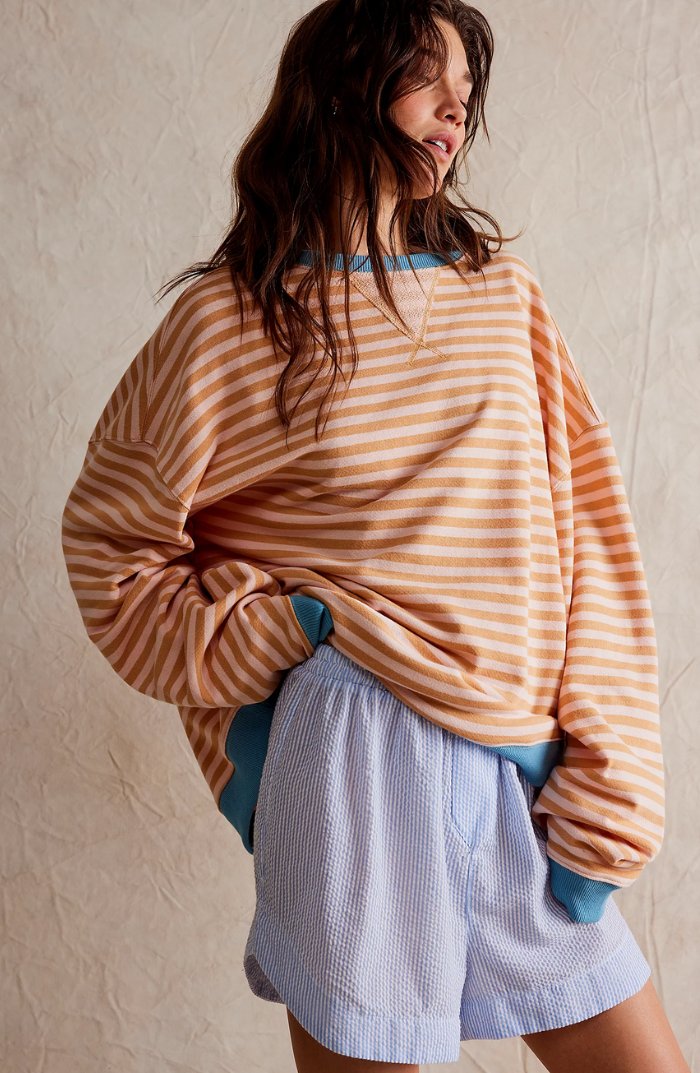 Women's oversized striped sweatshirt with contrast trim in orange stripes